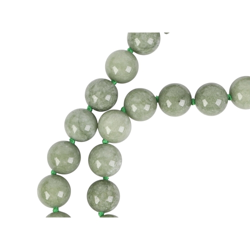 825 - A group of jade like / hardstone set white metal jewellery to include a necklace, approx 43cms long ... 