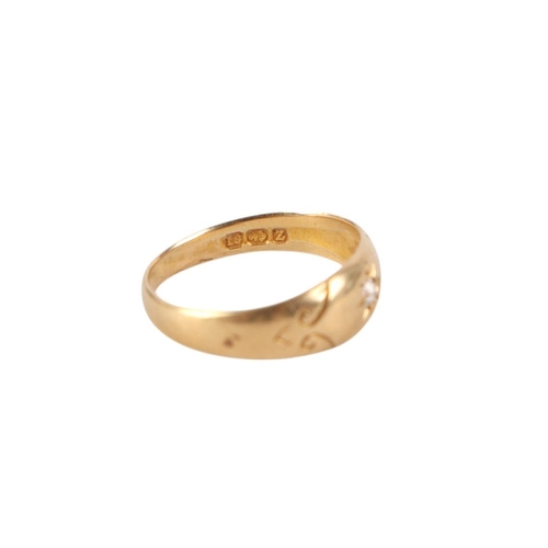 835 - An 18ct gold gypsy ring set with a single diamond, approx UK size L, 2.7g.