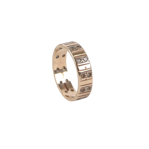 837 - A 9ct gold diamond eternity ring, approx UK size O, 3.6g.