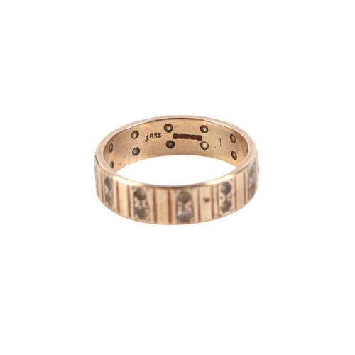 837 - A 9ct gold diamond eternity ring, approx UK size O, 3.6g.