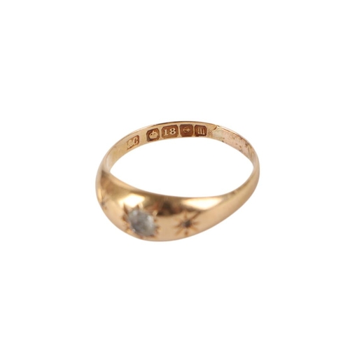 838 - An 18ct gold three-stone diamond gypsy ring, approx UK size O, 2g.