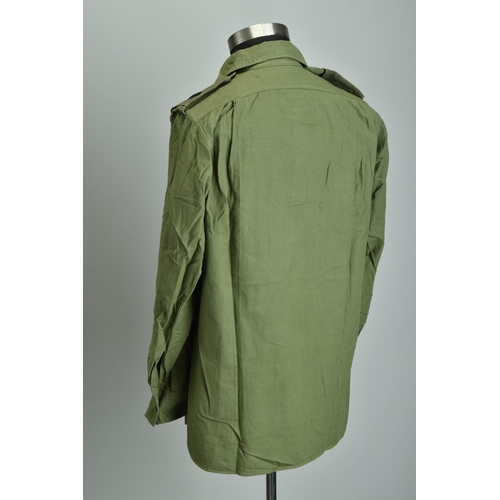 84 - A 1960s Aertex Uniform cellular shirt. British Army Jungle Combat Kit (ref: YDG).