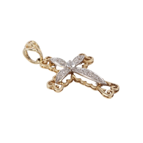 843 - A 9ct gold pendant cross set with white stones, 5.3g.