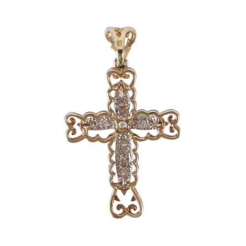 843 - A 9ct gold pendant cross set with white stones, 5.3g.