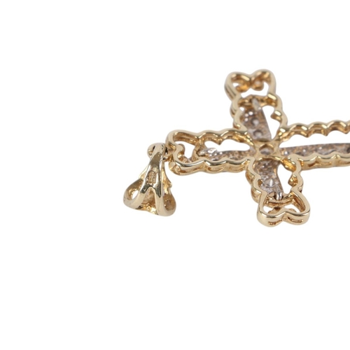 843 - A 9ct gold pendant cross set with white stones, 5.3g.