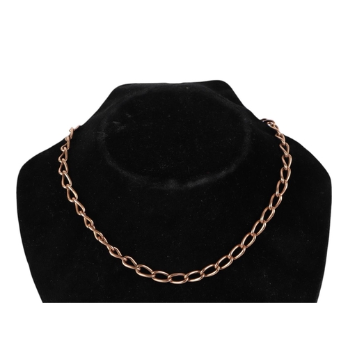 858 - A 9ct rose gold pocket watch chain, 40cms long, 30.3g.