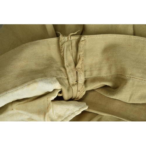 86 - A pair of WWII khaki drill uniform trousers (ref: XRE).