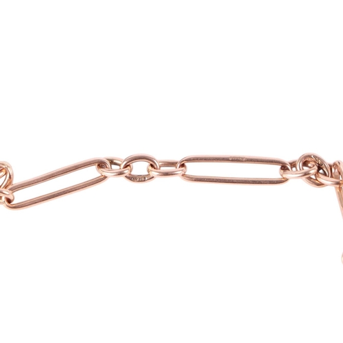 868 - A 9ct rose gold Albert pocket watch chain with T bar and dog clip, 36cms long, 16g.