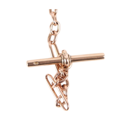 868 - A 9ct rose gold Albert pocket watch chain with T bar and dog clip, 36cms long, 16g.