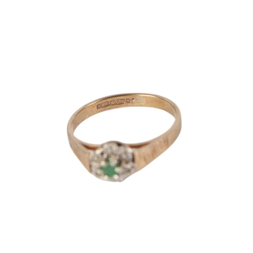 881 - A 9ct golds emerald and diamond cluster ring, approx UK size P, 2.2g.