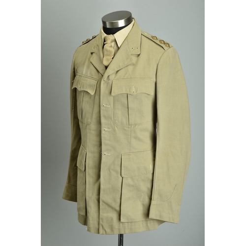 90 - 1941 WW2 Uniform. British India Raj IMS Officers' Service Dress with belts; together with a 1941 WW2... 