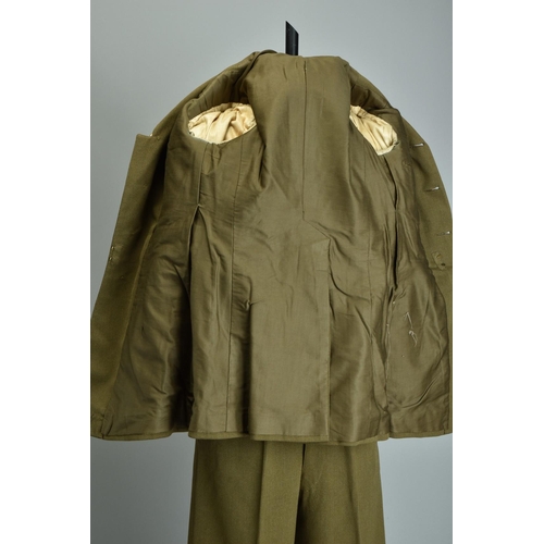 90 - 1941 WW2 Uniform. British India Raj IMS Officers' Service Dress with belts; together with a 1941 WW2... 