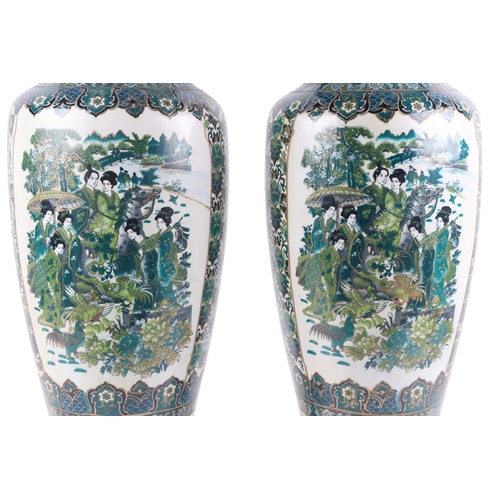 903 - A pair of large modern Chinese style famille vert floor vases, 59cms high (both a/f).