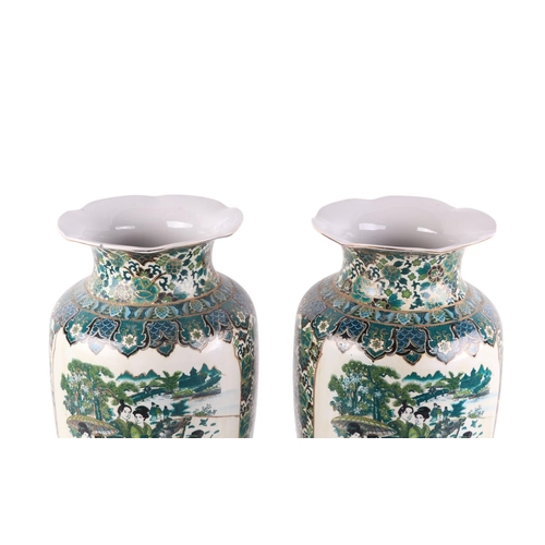 903 - A pair of large modern Chinese style famille vert floor vases, 59cms high (both a/f).