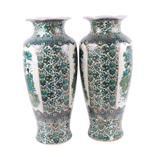 903 - A pair of large modern Chinese style famille vert floor vases, 59cms high (both a/f).