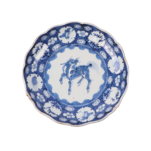 908 - A set of three Chinese blue & white porcelain plates decorated with qilin within a band of insects a... 