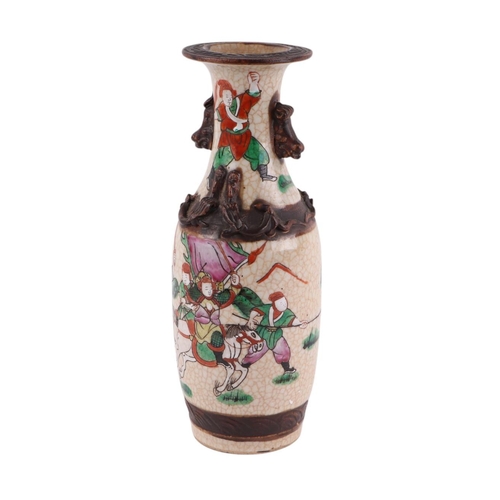 911 - A Japanese crackle glaze baluster vase decorated with warriors, character mark to base, 25cms high.C... 