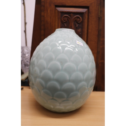 914 - A Chinese Celadon glaze vase in the form of a fir cone, 25cms high.Condition ReportGood condition wi... 