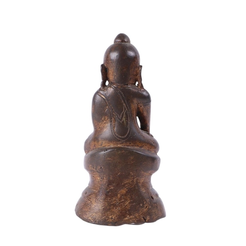 919 - A Burmese gilt bronze figure of a seated Buddha, 18cms high.