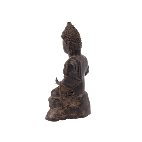 923 - A bronze figure of a seated Buddha, 19cms high.