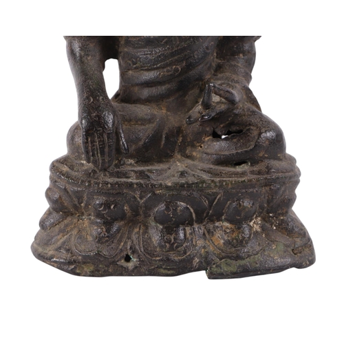 923 - A bronze figure of a seated Buddha, 19cms high.