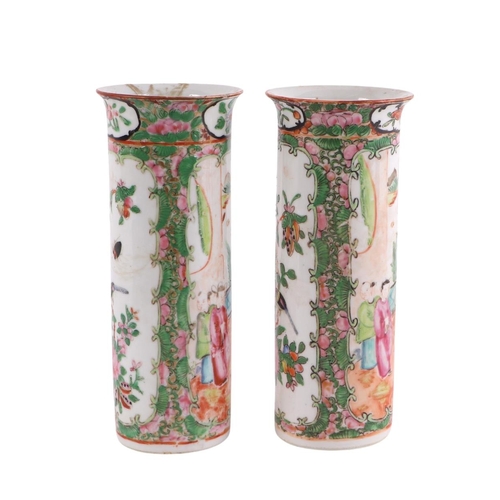 930 - A pair of Chinese Canton Export famille rose lidded vases decorated with figures, four character blu... 