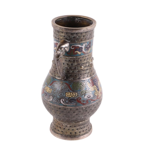 934 - A Chinese bronze / brass enamel two-handled vase, 25cms high.