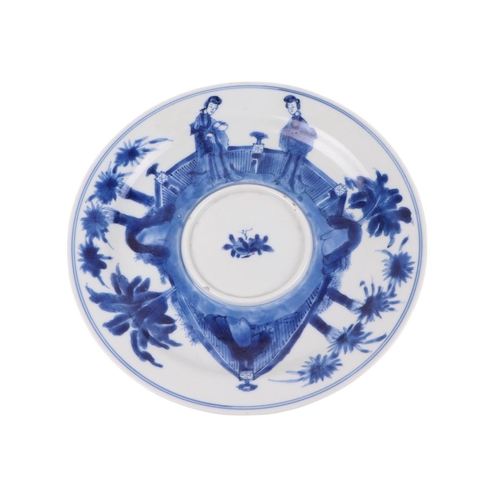 935 - A Chinese blue & white saucer dish decorated with figures, six character mark to the underside, 26cm... 