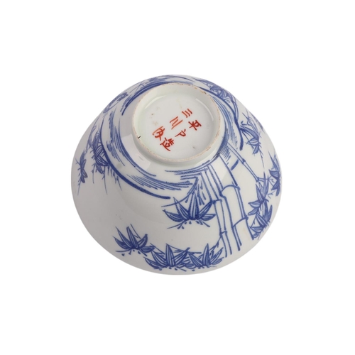 943 - A quantity of Chinese blue & white rice grain bowls, covers, side plates and spoons.