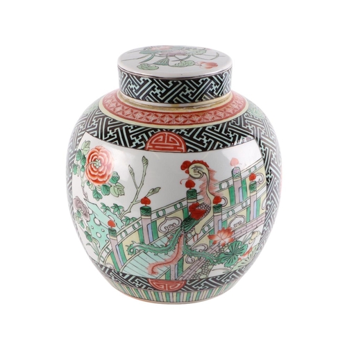 957 - A Chinese famille vert ginger jar and cover decorated with birds amongst flowering foliage, 24ins hi... 