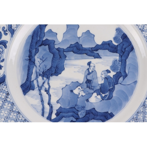 958 - A Chinese blue & white plate decorated with temple lions, 28cms diameter; together with a Chinese bl... 