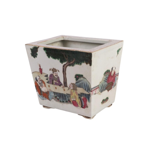 972 - A Chinese famille rose square tapering form planter decorated with figures, red seal mark to the und... 