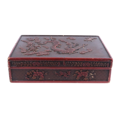 976 - A Chinese lacquer box decorated with a dragon, phoenix and tiger, 29 by 39cms; together with a Chine... 