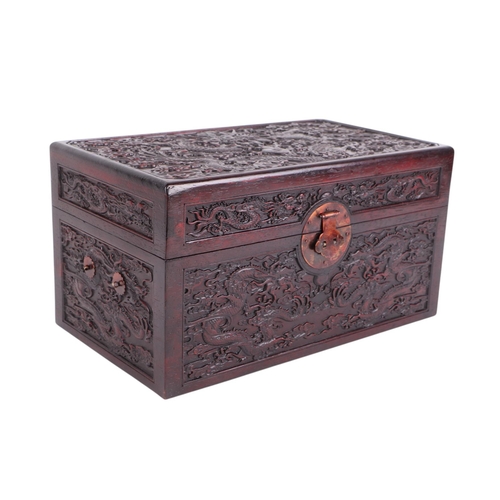 976 - A Chinese lacquer box decorated with a dragon, phoenix and tiger, 29 by 39cms; together with a Chine... 