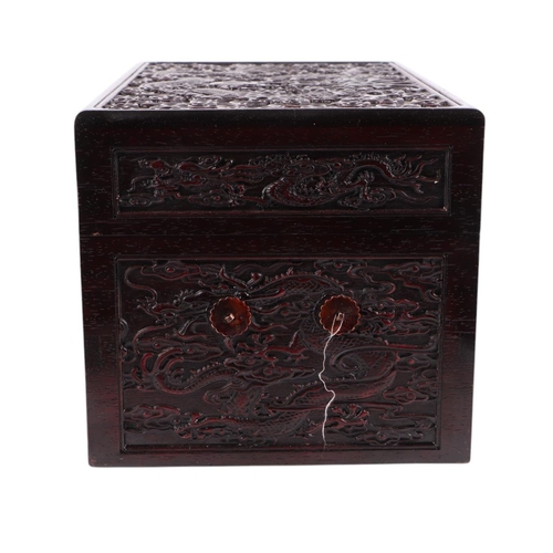 976 - A Chinese lacquer box decorated with a dragon, phoenix and tiger, 29 by 39cms; together with a Chine... 