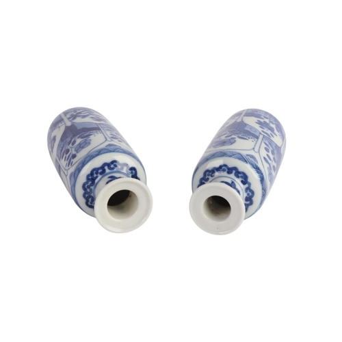 979 - A pair of Chinese blue & white vases decorated with flowers, blue artemisia mark to the underside, 1... 