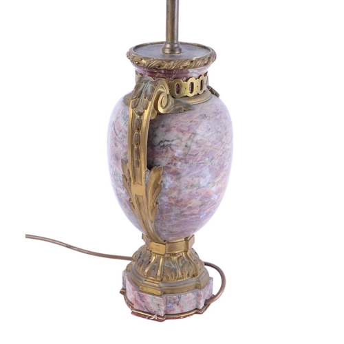 999 - A gilt bronze and rouge figured marble table lamp, 56cms high.