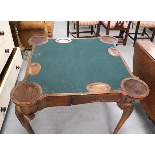 1107 - A 19th century Queen Anne style walnut concertina action card table, the quarter veneered top with c... 