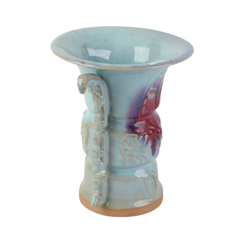 907 - A Chinese pale blue glazed Gu type vase with four character mark to the underside, 19cms high; toget... 