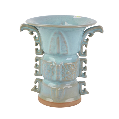 907 - A Chinese pale blue glazed Gu type vase with four character mark to the underside, 19cms high; toget... 