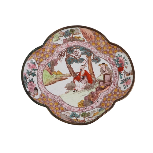 940 - A Chinese enamel shaped dish decorated with figures in a landscape, 12cms wide; together with a Chin... 