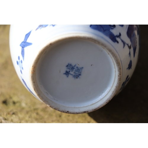 968 - A Chinese blue & white double gourd vase decorated with a bird amongst flowering foliage, four chara... 