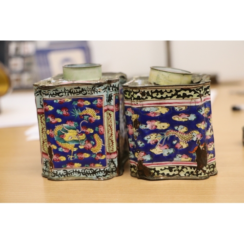 978 - A pair of Chinese enamel tea caddies decorated with dragons amongst clouds, 9cms high (both a/f); to... 