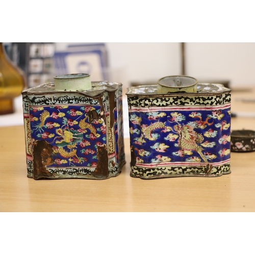 978 - A pair of Chinese enamel tea caddies decorated with dragons amongst clouds, 9cms high (both a/f); to... 