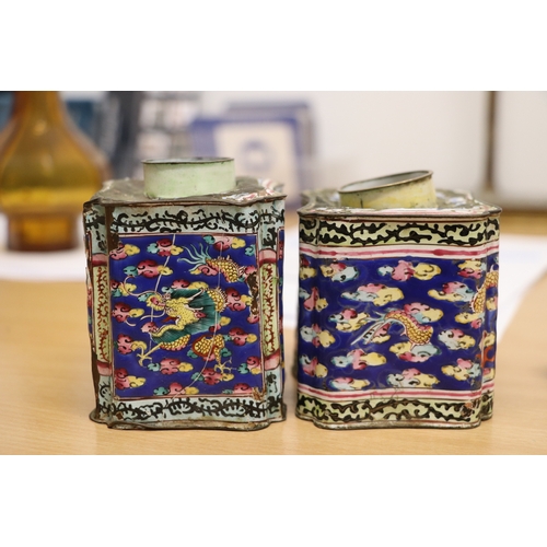 978 - A pair of Chinese enamel tea caddies decorated with dragons amongst clouds, 9cms high (both a/f); to... 