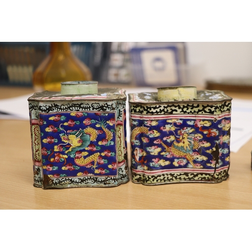 978 - A pair of Chinese enamel tea caddies decorated with dragons amongst clouds, 9cms high (both a/f); to... 