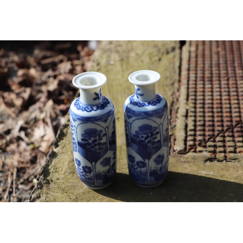 979 - A pair of Chinese blue & white vases decorated with flowers, blue artemisia mark to the underside, 1... 