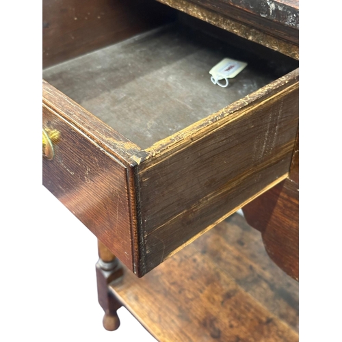 1078 - An oak dresser, 18th century elements and later, the raised plate rack with two shelves above three ... 