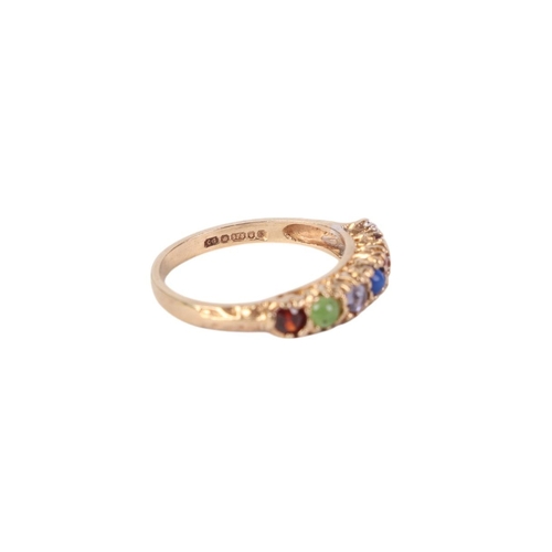 A 9ct gold 'Darling' ring set with seven different stones that spell ...