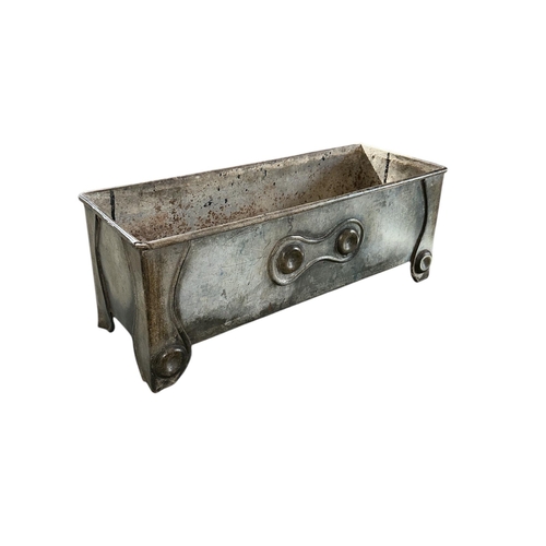 19 - An Art Nouveau galvanised rectangular planter, 52cms long; together with a metal boiler / planter, 4... 